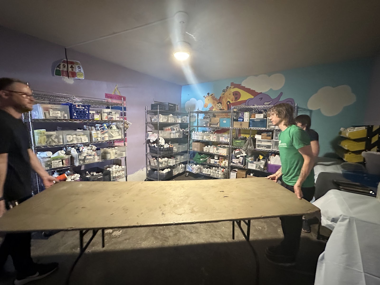 NWB volunteers setting up a clinic space and organizing supplies